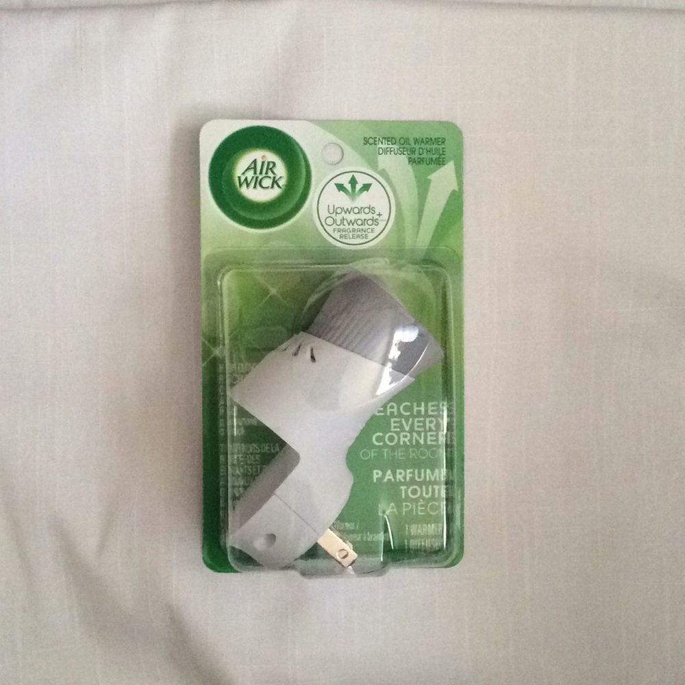 FREE w/ any purchase - Airwick scented oil warmer